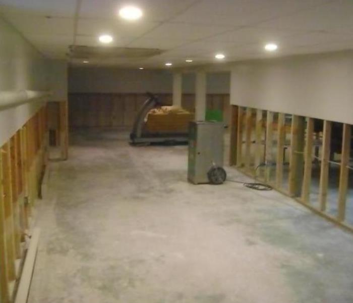 basement with concrete floor and wood framing exposed
