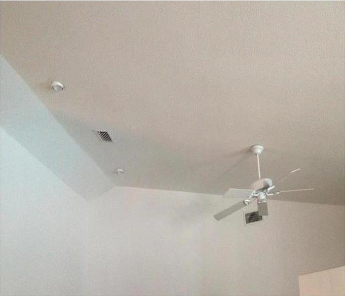 ceiling painted white with a white ceiling fan