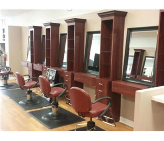 salon withered salon chairs, wood floor and wood cabinets