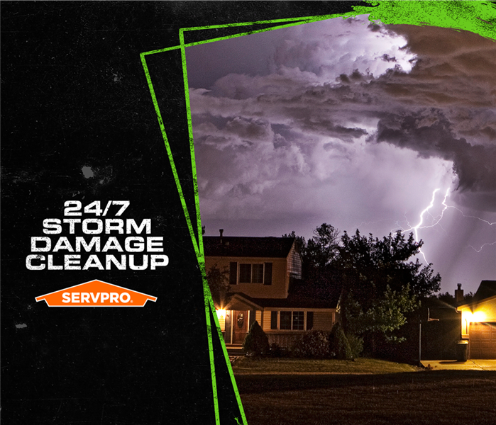 Thunder/lighting storm over a home with the caption 24/7 Storm Damage Cleanup SERVPRO